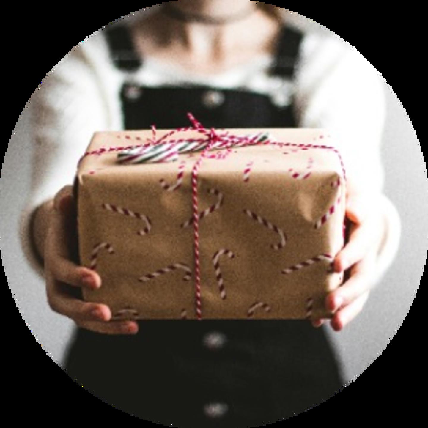 Woman holding Christmas present